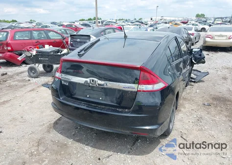 2012 Honda Insight from USA, damaged, VIN JHMZE2H36CS000448